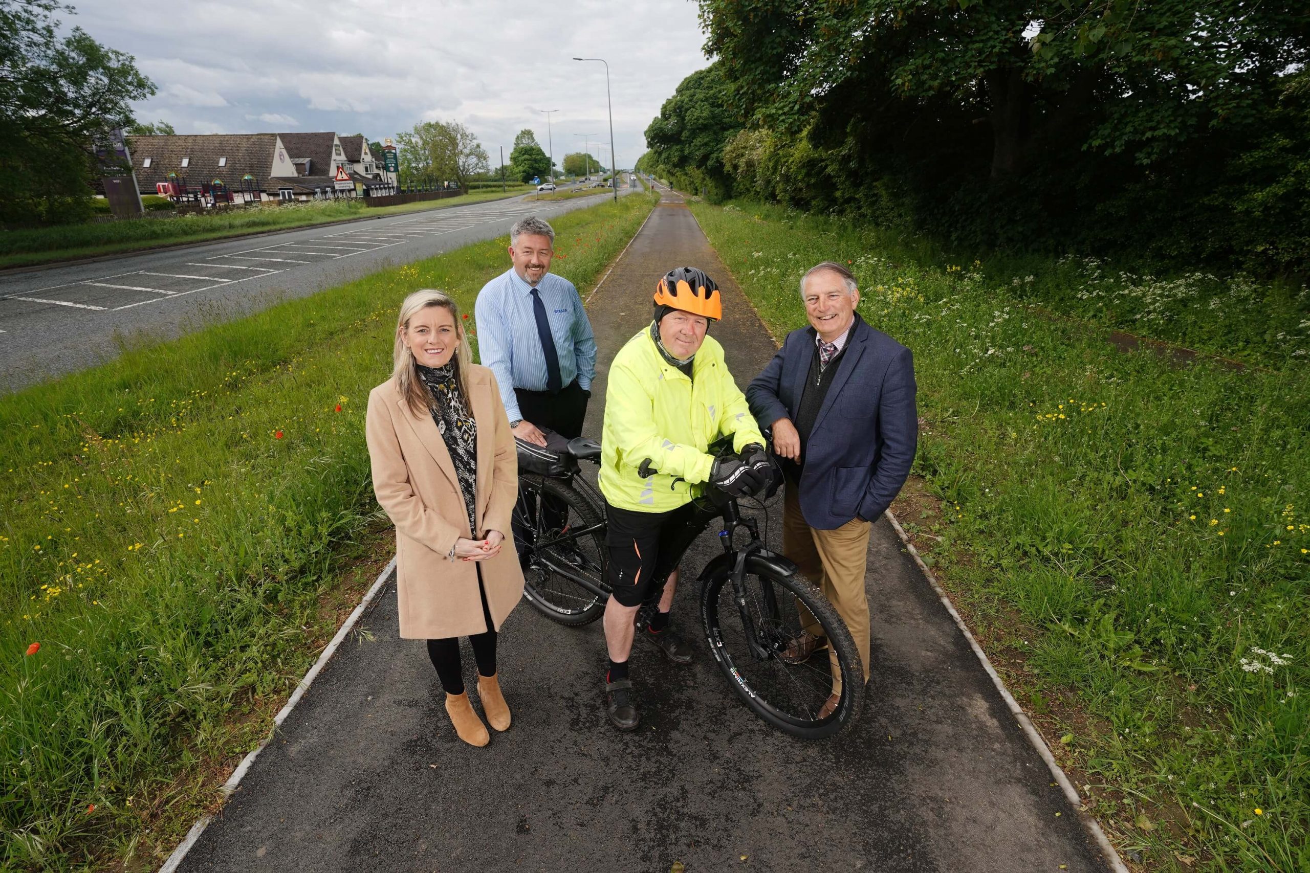 (L-R): Dawn Brown, sustainable travel officer; Thomas Prentice, from Aycliffe Business Park Community; Paddy O’Connor, volunteer cycle leader; and Cllr James Rowlandson, Cabinet member for resources, investment and assets.